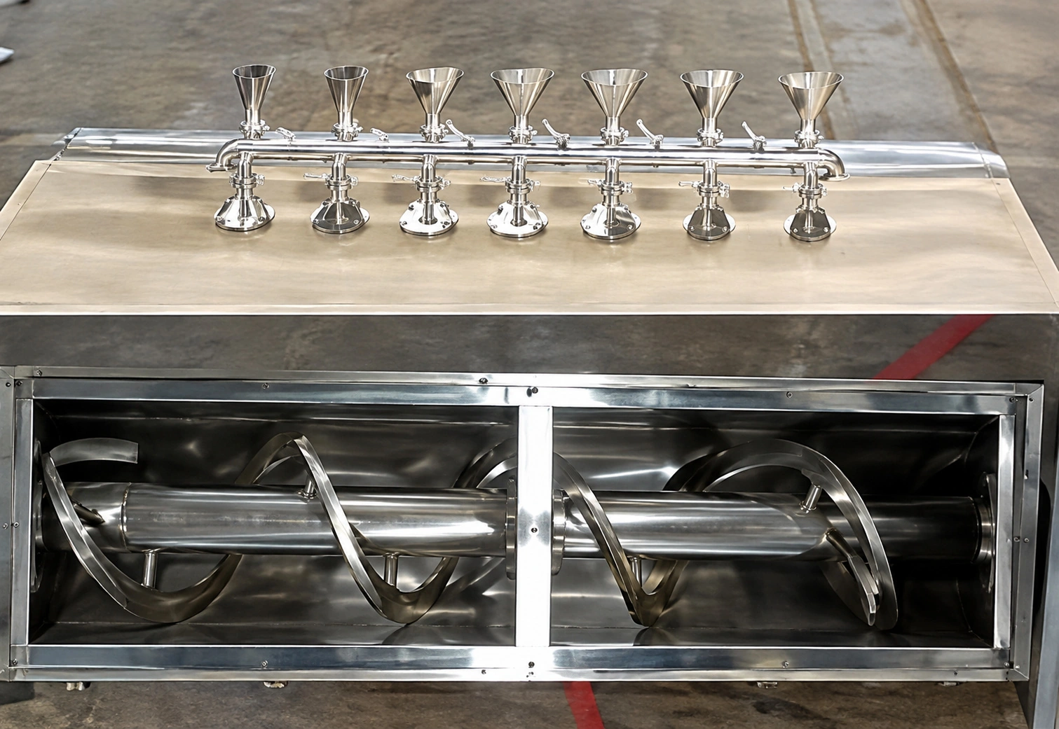 Paddle and ribbon continuous mixing tools