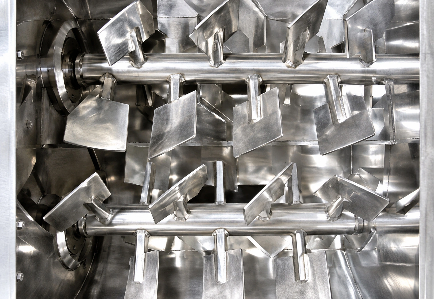 Double shaft paddle mixer mixing action